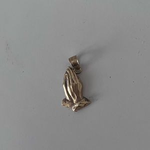 praying hands gold pendant
